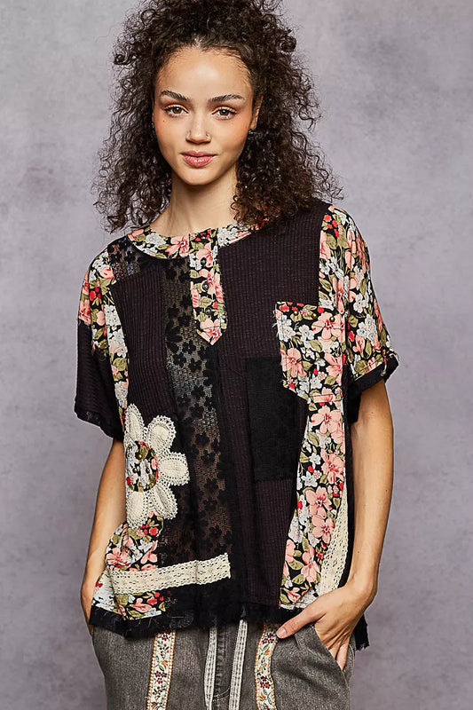 Black Rib knit short sleeve top blends playful florals and lace in a round button neck blouse for casual boho luxe style