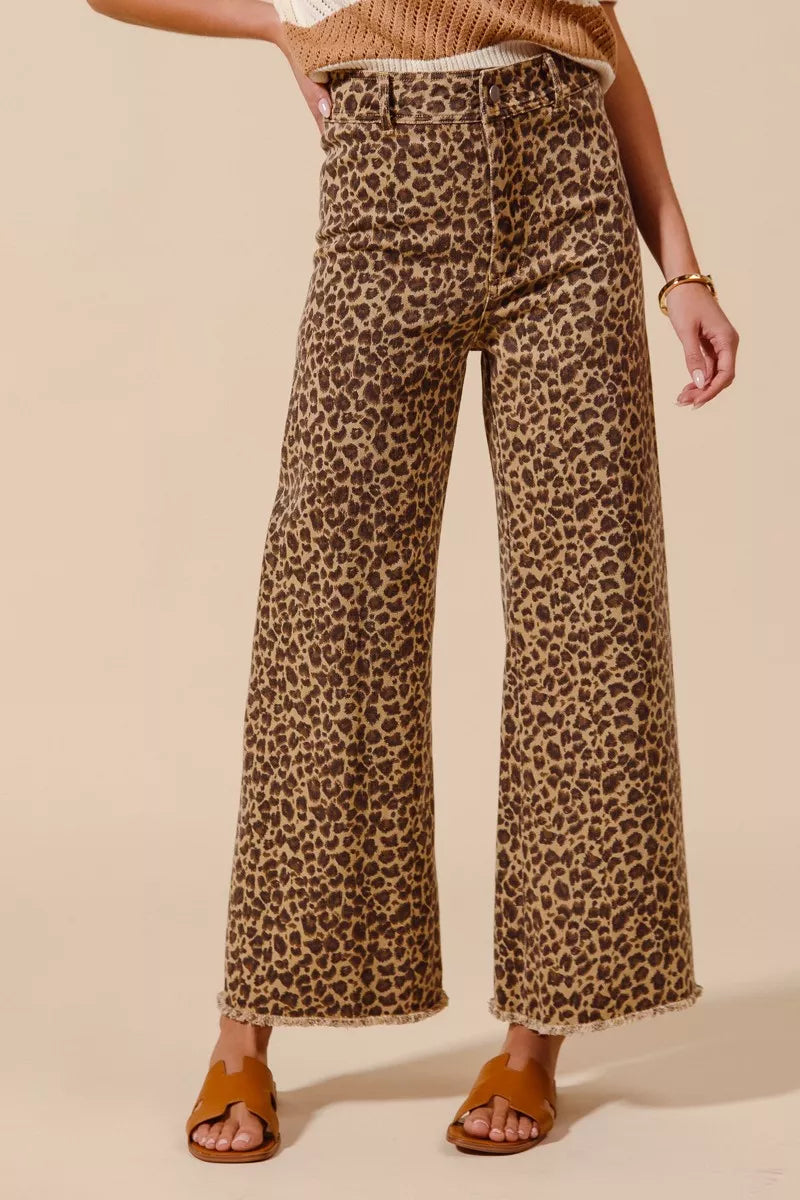 high waist leopard print wide leg jeans with raw frayed hem, bold statement denim for modern boho luxe looks