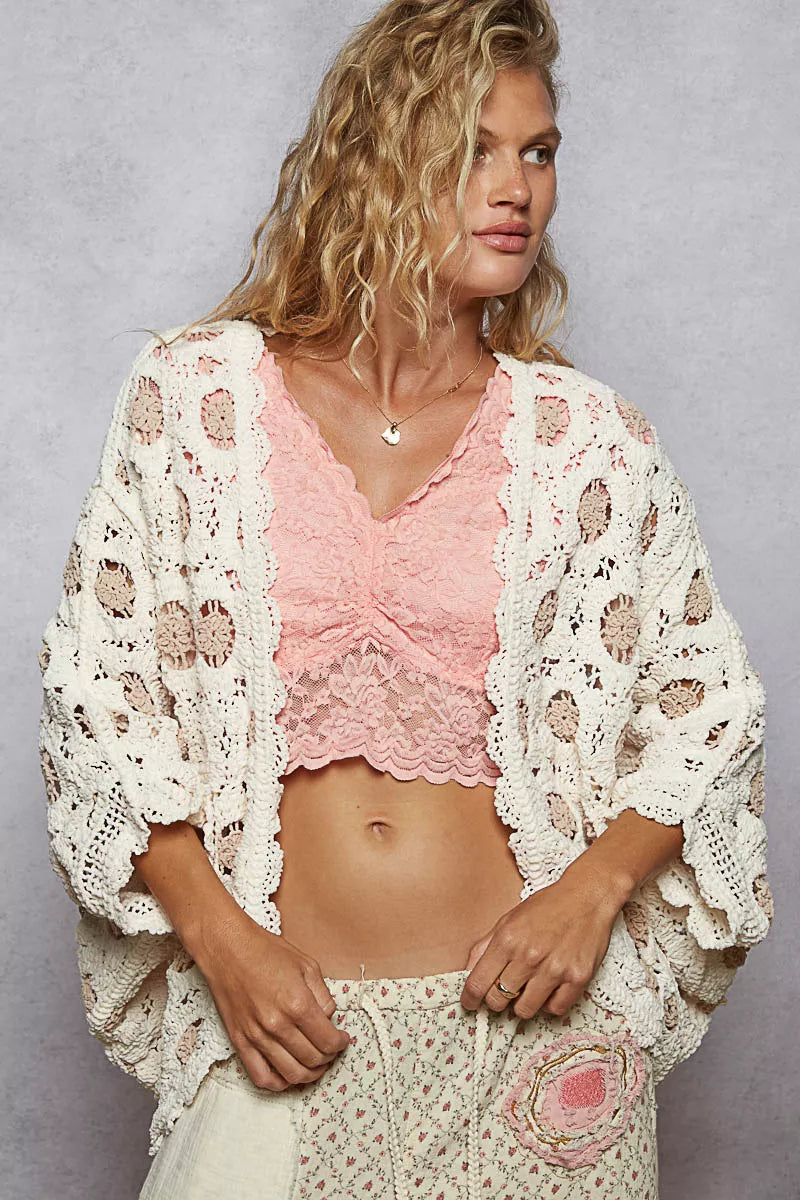 Relaxed cream crochet cardigan with scalloped edge and wide batwing sleeves for slouchy fit