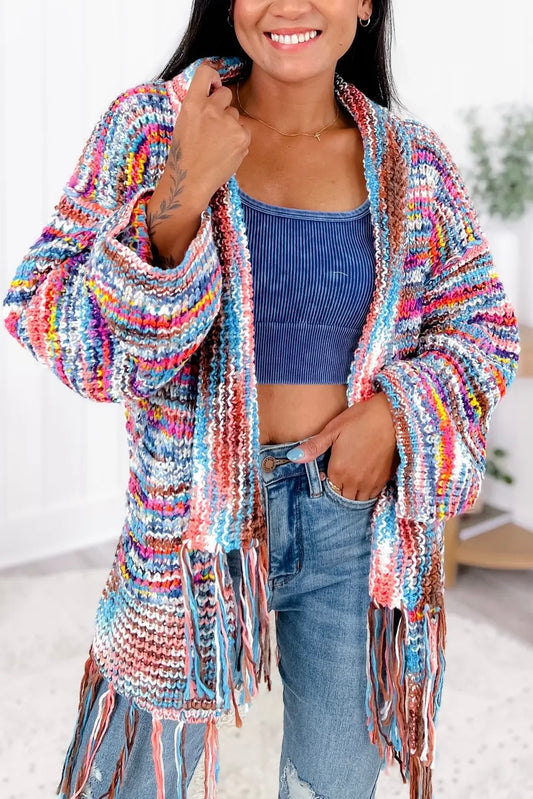 POL Striped fringe cardigan with shawl collar and tassel hem styled open for boho luxe layering look.
