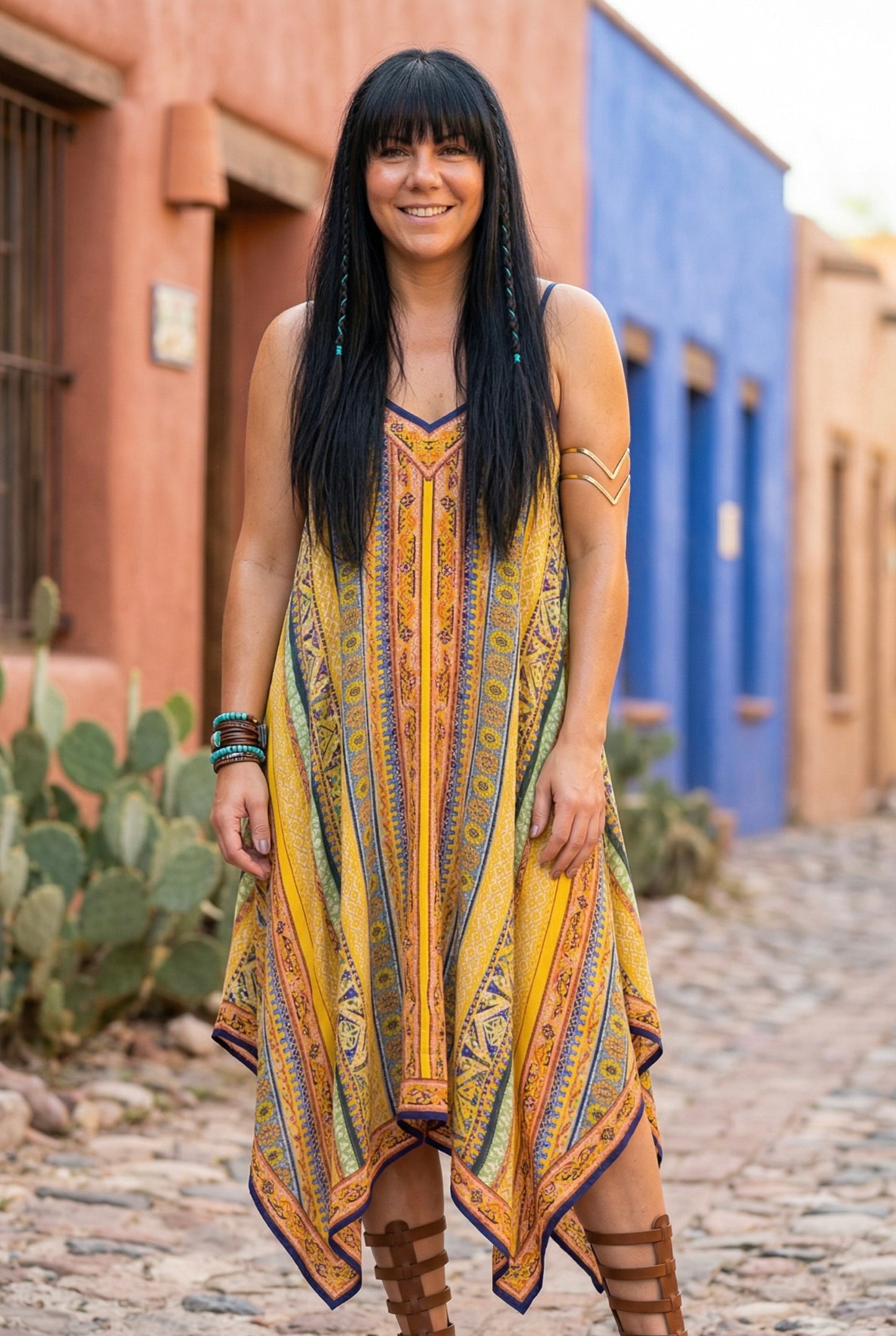 Yellow boho print handkerchief hem v neck sleeveless midi dress with a flowy fit, front view festival outfit
