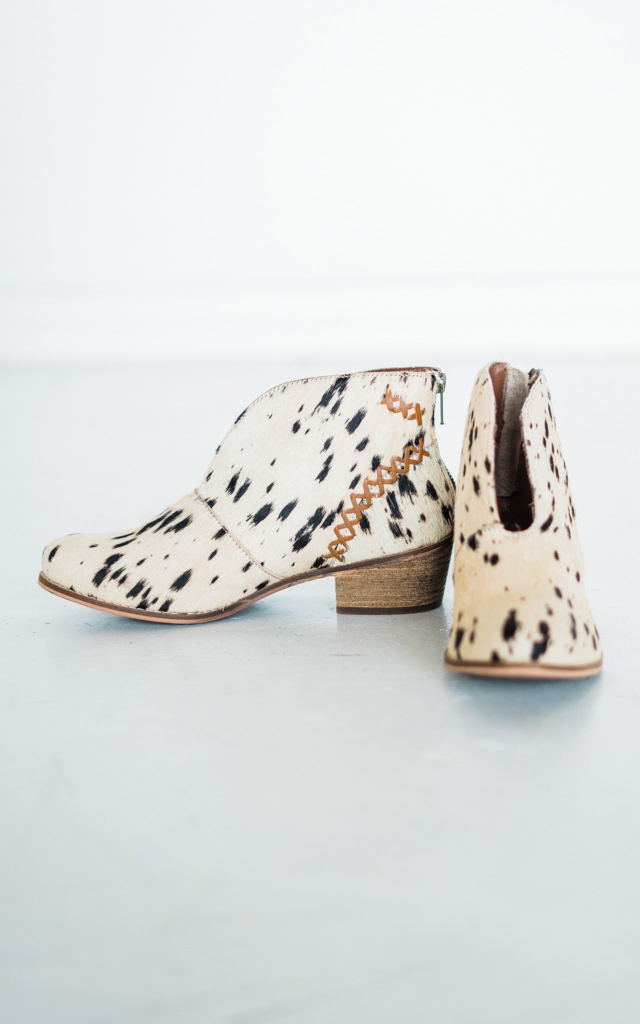 All Roads Calf Hair Bootie in Black and White