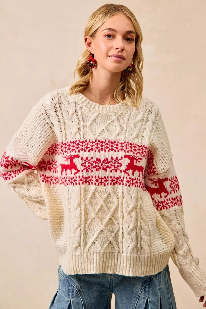 cream cable knit holiday pullover sweater with red fair isle deer pattern for effortless party-ready winter style