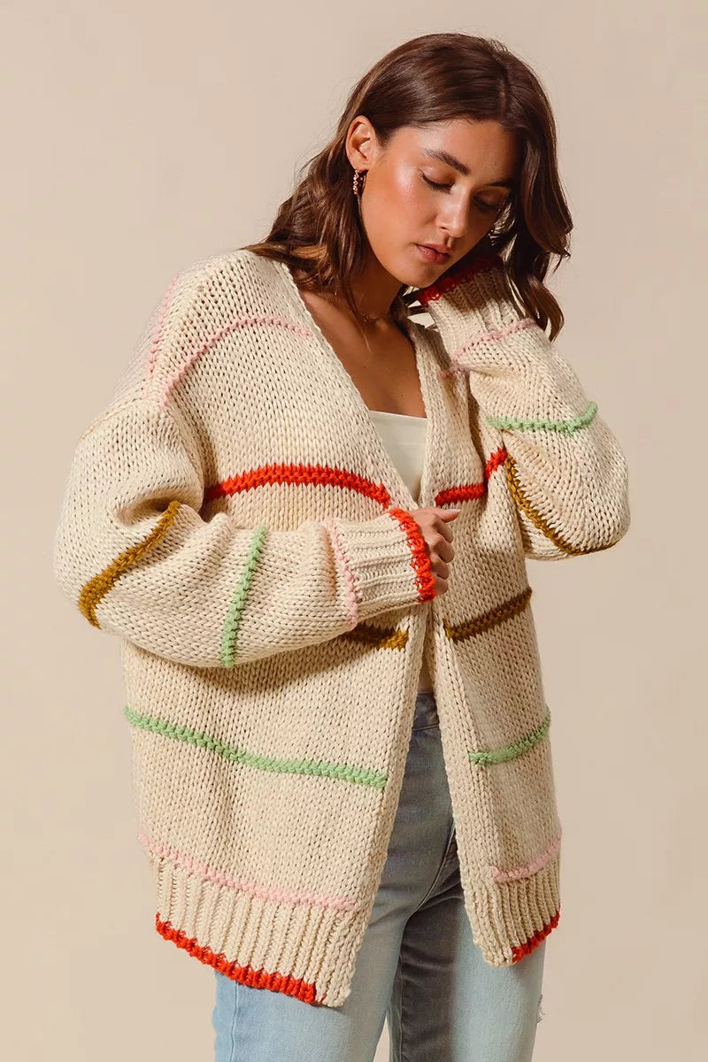women’s beige and colorblock stripe cardigan styled with jeans for an effortless everyday outfit