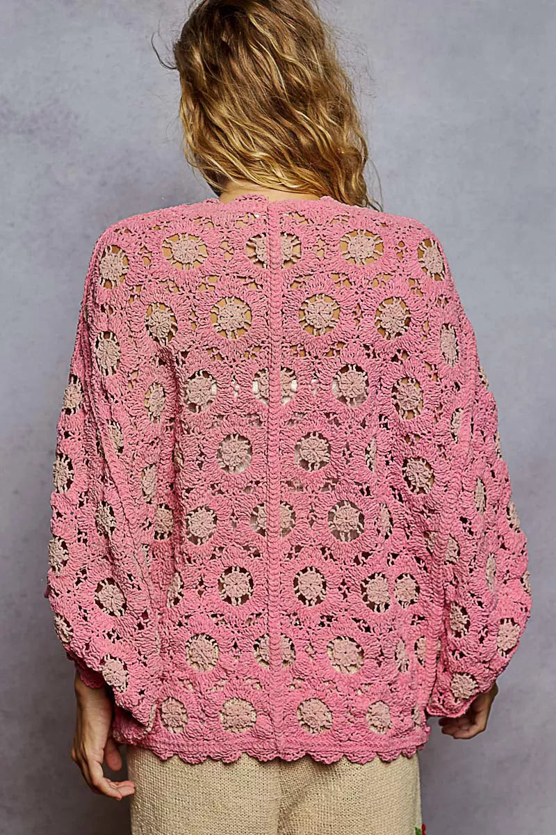 Pink floral crochet chenille cardigan, back showing allover floral crochet and scalloped hem