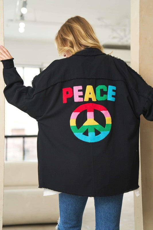 Camisa con botones bordados de People For Peace