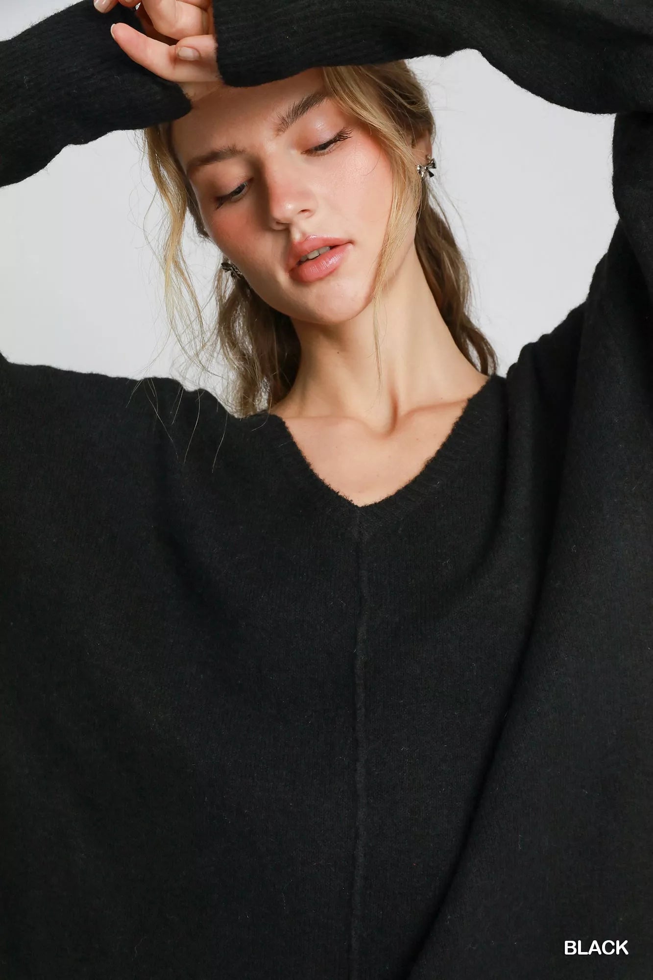 Women’s black V neck wool blend sweater, long sleeve pullover knit with slouchy fit for layering and lounging, neckline seam detail