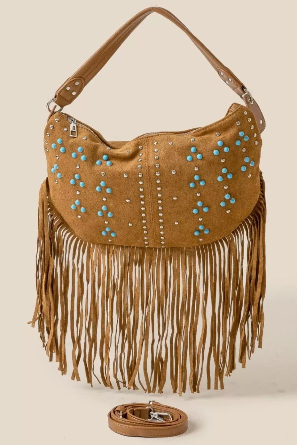Boho luxe vegan suede hobo bag with long fringe, turquoise studs and western inspired detailing