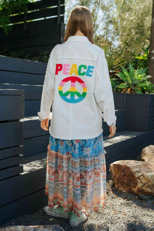 Camisa con botones bordados de People For Peace