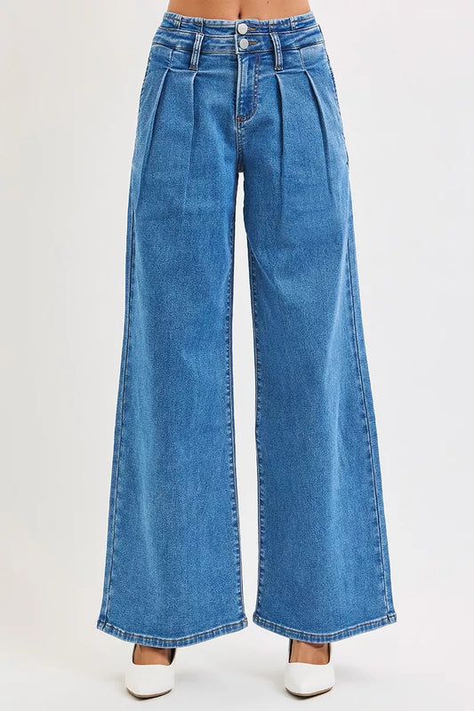 Front view of Risen mid rise wide leg pleated jeans with double button waist
