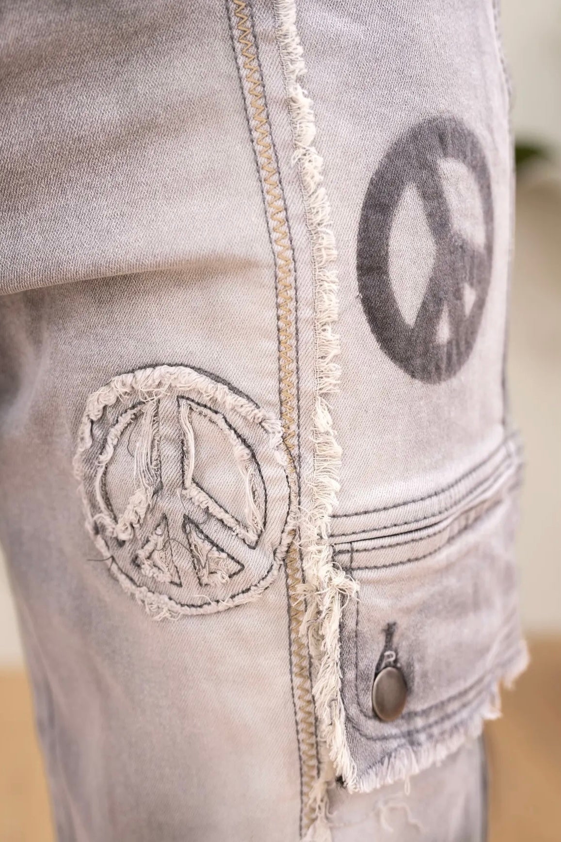 Miss me jeans with peace orders sign on pocket