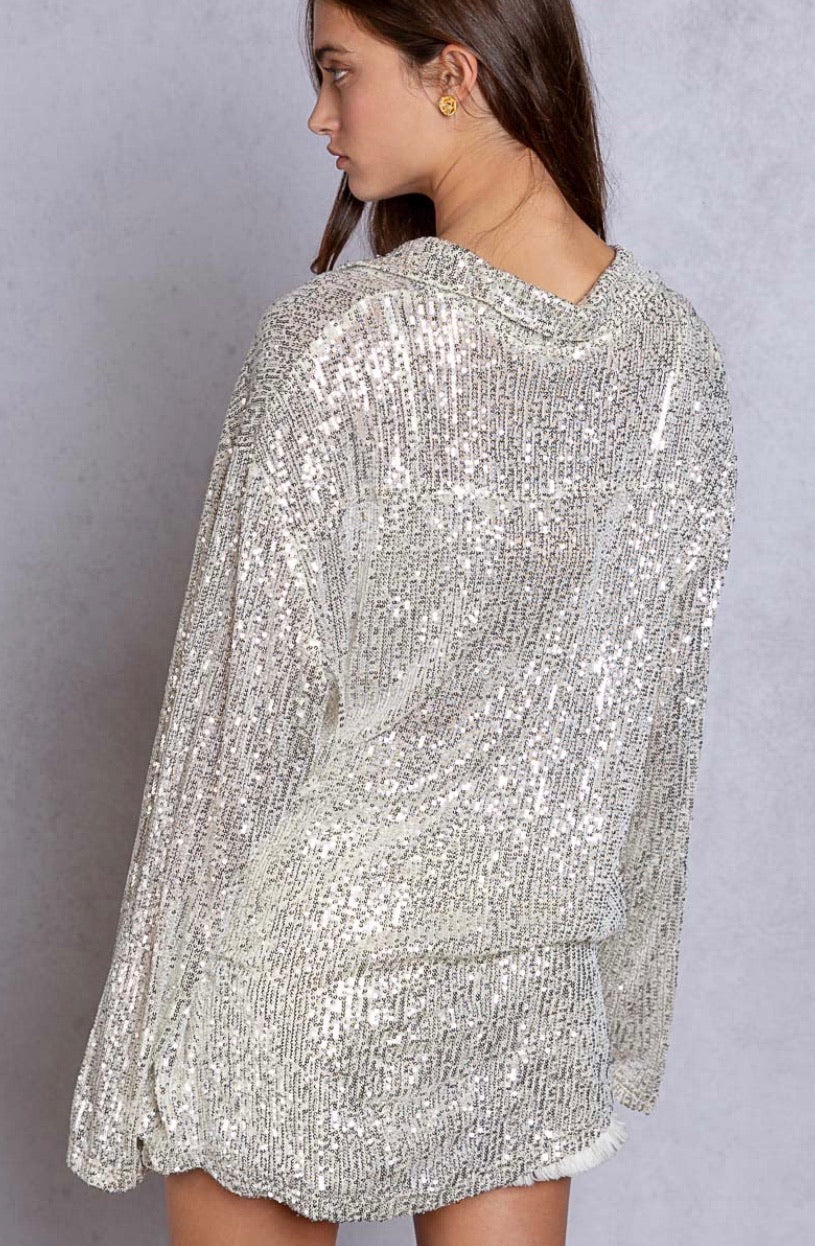 Silver sequin button down shirt with long sleeves and relaxed fit, chic sparkly party top for holiday or event outfits