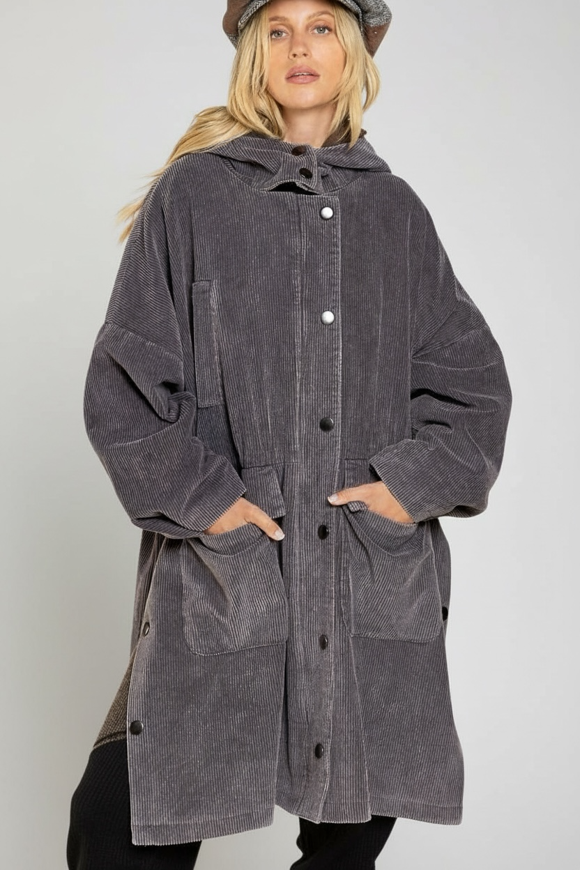 charcoal gray corduroy long coat with oversized fit, hood, snap zip front, and roomy flap pockets for cold weather winter layering