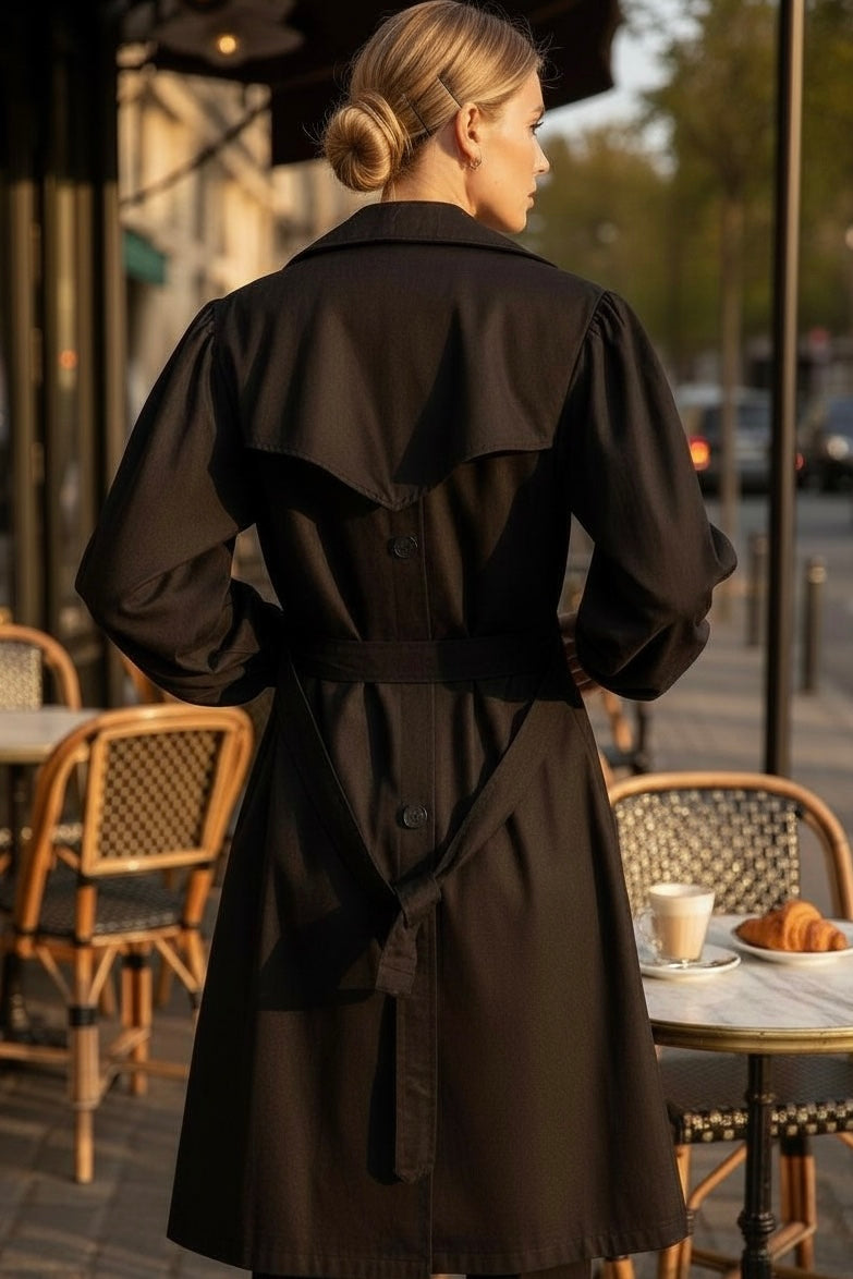 Black trench coat storm flap back with belted waist and structured shoulders for preppy polished everyday style