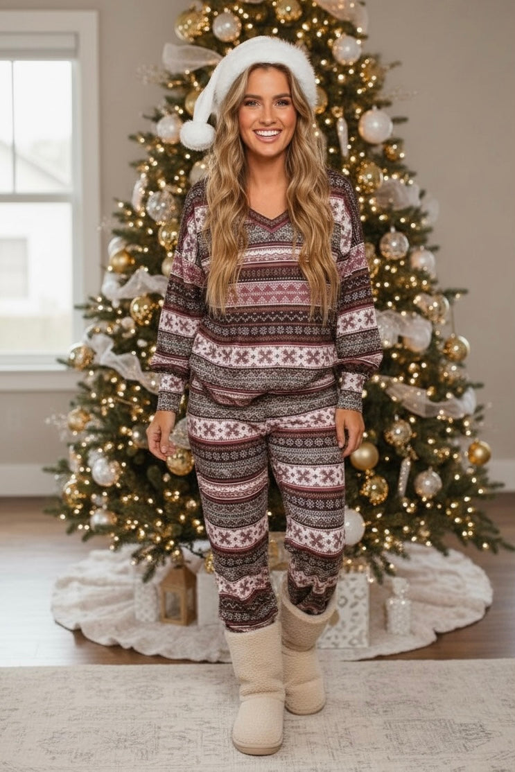 Soft brushed knit Fair Isle pajama set styled with slippers and a holiday tree for a cozy Christmas morning outfit idea.