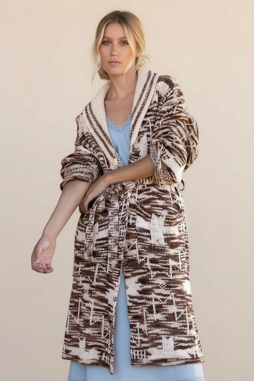 Belted long knit cardigan in brown and beige with collared neckline, styled over a blue midi dress for relaxed everyday layering