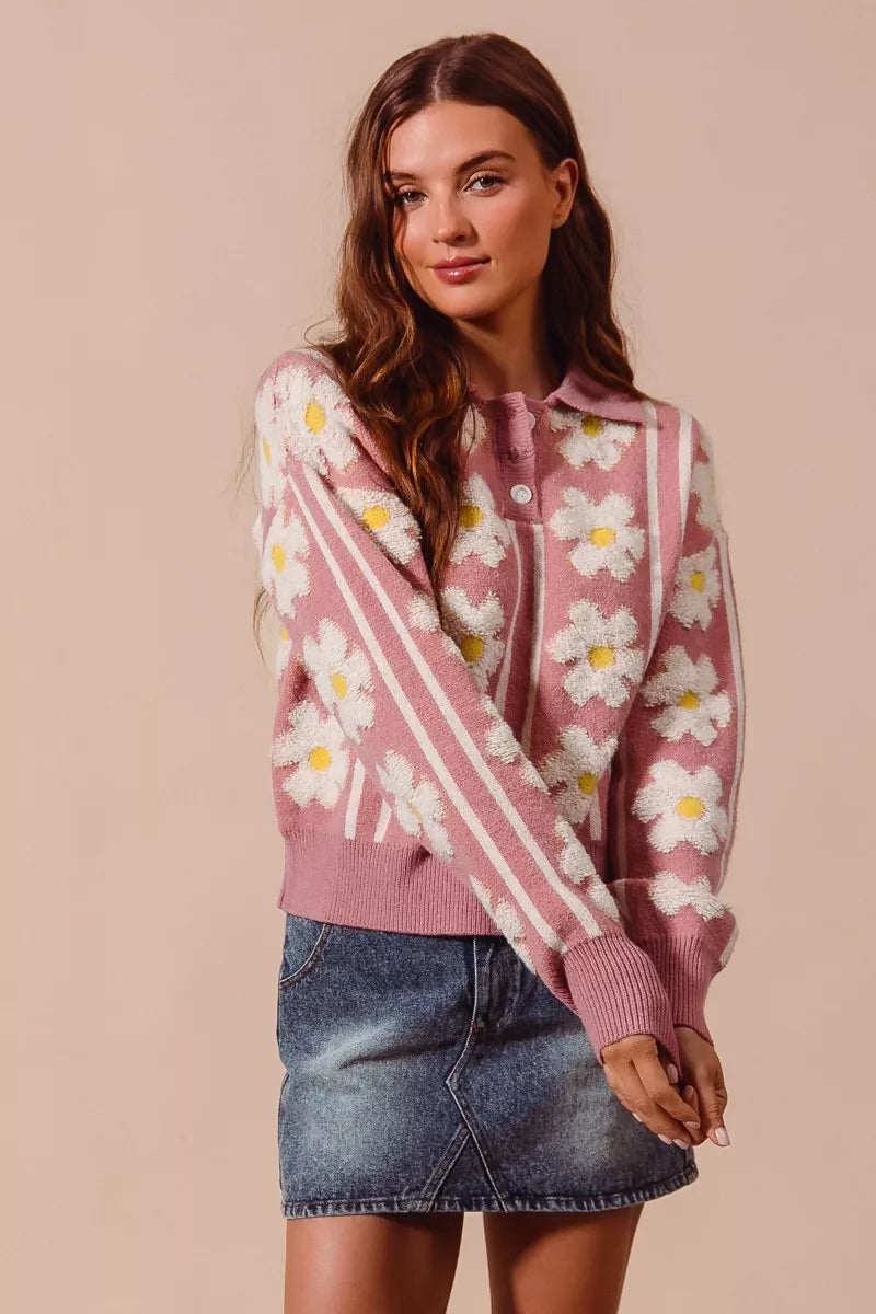 Mauve polo sweater with button neckline and striped floral pattern
