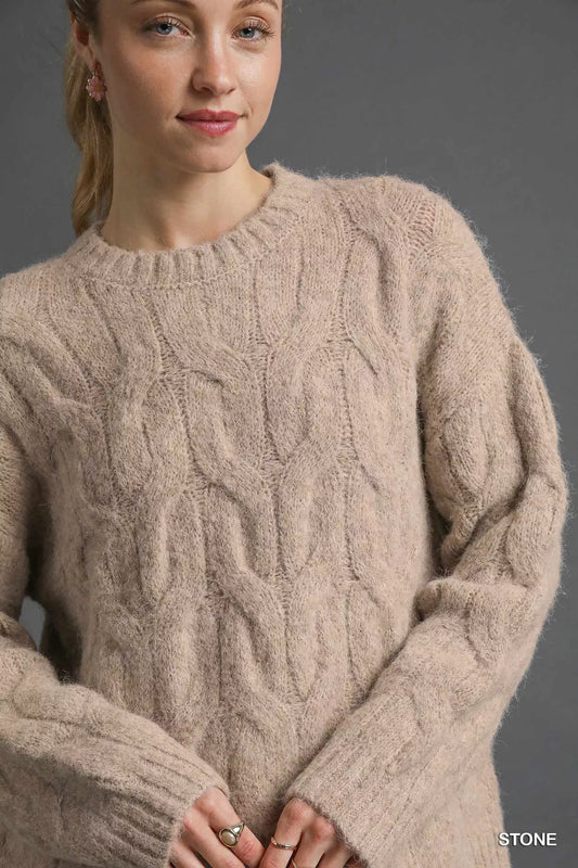 beige brushed cable knit sweater, closeup of women’s solid neutral pullover knit with cozy chic minimalist detail
