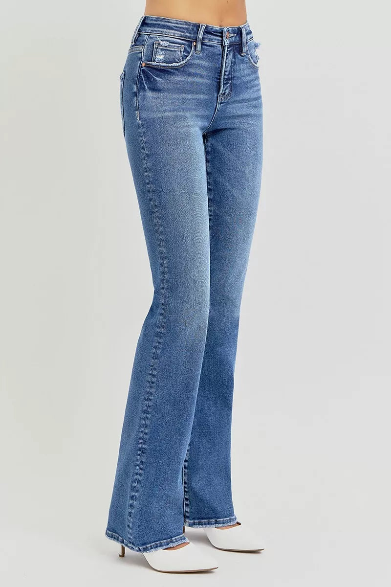 Dark wash tummy control jeans with straight leg cut, stretch denim side profile showing slim fit silhouette.