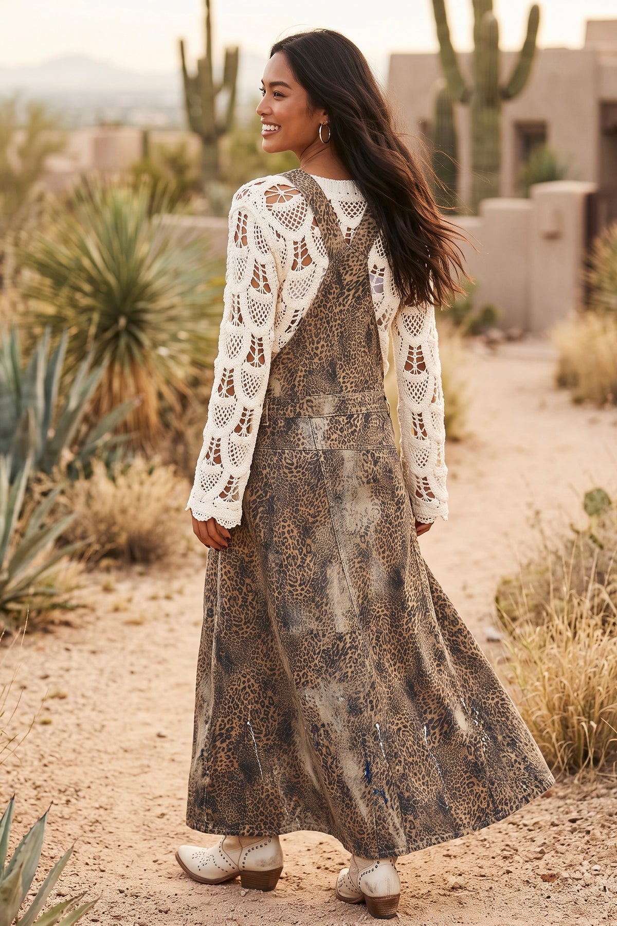 Boho leopard denim maxi dress back view with crossed straps, waist seam and paint splatter hem