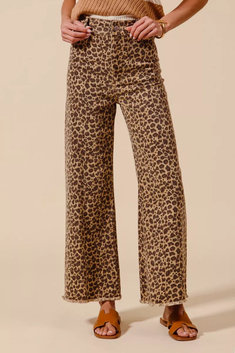 Wide leg ankle cropped leopard print denim jeans with a high waist and raw hems - effortless style that goes from day to date night