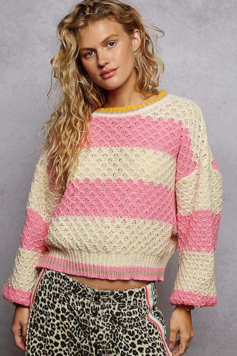 Pink and cream striped statement sweater pullover in textured knit for bold feminine fall style
