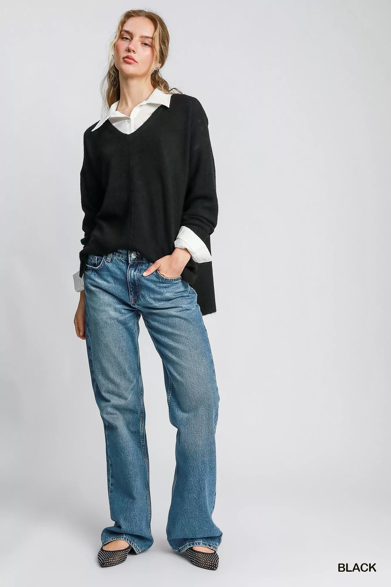 Solid black women’s pullover sweater in brushed wool blend knit, slouchy V neck style with minimalist prep revival vibe